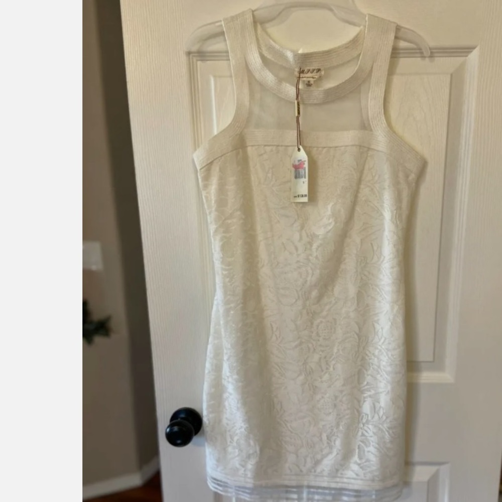 Women's cream colored embroidered max studio dress